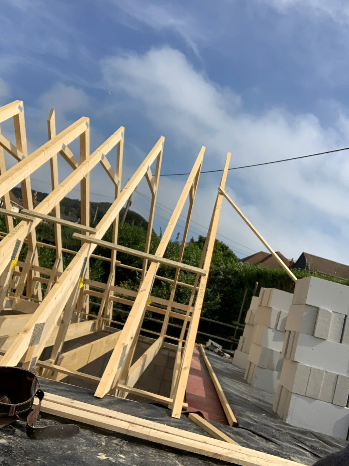Cut roof trusses and rafters framed on a new loft build in East Devon by AJW Carpentry
